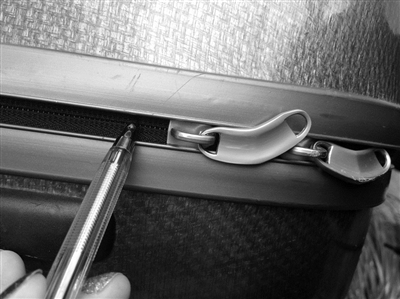 用一支筆能輕易打開拉桿箱？